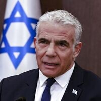 Prime Minister Yair Lapid heads a cabinet meeting in Jerusalem, on November 20, 2022. (Menahem KAHANA / POOL / AFP)