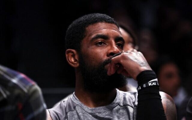 Kyrie Irving, #11 of the Brooklyn Nets, looks on from the bench during the second quarter of the game against the Chicago Bulls at Barclays Center on November 01, 2022 in New York City. (Dustin Satloff/GETTY IMAGES NORTH AMERICA/Getty Images via AFP)