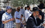 Jewish men pray in a quorum on the Temple Mount in Jerusalem, July 19, 2021. (Jeremy Sharon)