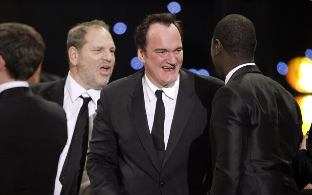 Producer Harvey Weinstein, left, and director Quentin Tarantino react after 'Inglourious Basterds' won the award for best cast of a movie at the 16th Annual Screen Actors Guild Awards on Jan. 23, 2010, in Los Angeles.  (AP Photo/Mark J. Terrill)