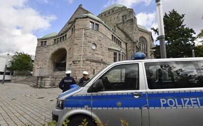 Police secure a synagogue in Essen, Germany, October 10, 2019. (AP Photo/Martin Meissner)