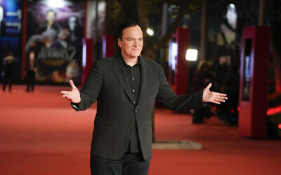 Director Quentin Tarantino poses on the red carpet for his Lifetime Achievement Award ceremony at the 16th edition of the Rome Film Fest in Rome, October 19, 2021. (AP Photo/Gregorio Borgia)