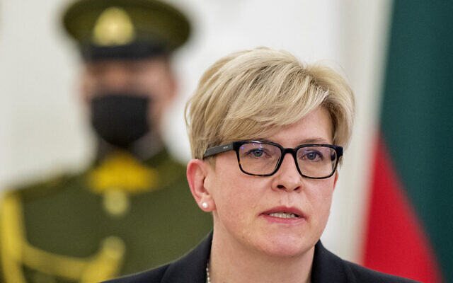 Lithuania's Prime Minister Ingrida Simonyte speaks during a news conference at the Presidential Palace in Vilnius, Lithuania, November 28, 2021. (AP Photo/Mindaugas Kulbis)