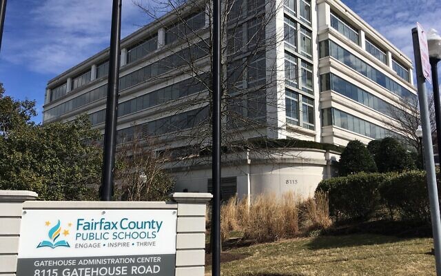 File: The Fairfax County Public Schools building stands in Merrifield, Virginia., on March 4, 2019 (AP Photo/Matthew Barakat, File)