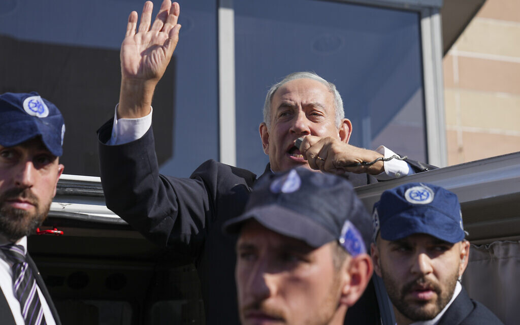 Likud leader Benjamin Netanyahu waves to his supporters during a national election, in Ashkelon, Nov. 1, 2022. (AP Photo/Tsafrir Abayov)