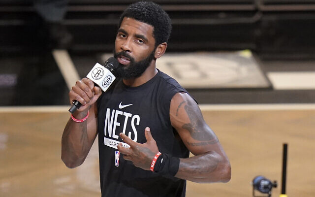 Brooklyn Nets' Kyrie Irving speaks before the team's NBA basketball game against the New Orleans Pelicans on Oct. 19, 2022, in New York.  (AP Photo/Frank Franklin II)