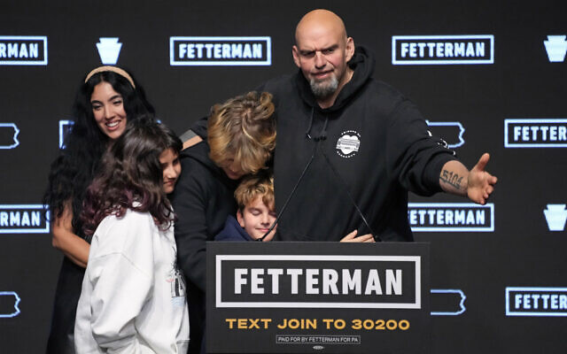 Pennsylvania Lt. Gov. John Fetterman, Democratic candidate for US Senate from Pennsylvania, right, is joined by his family after addressing supporters at an election night party in Pittsburgh, November 9, 2022. (Gene J. Puskar/AP)
