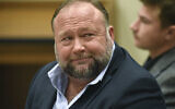 Infowars founder Alex Jones appears in court to testify during the Sandy Hook defamation damages trial at Connecticut Superior Court in Waterbury, Conn., on Thursday, Sept. 22, 2022. (Tyler Sizemore/Hearst Connecticut Media via AP, Pool, File)