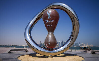 The official FIFA World Cup Countdown Clock on Doha's corniche, overlooking the skyline of Doha, Qatar, October 19, 2022. (AP/Nariman El-Mofty, File)