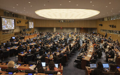 The UN General Assembly Fourth Committee votes on measures addressing the Israeli-Palestinian conflict at UN headquarters in New York, November 11, 2022. (AP/Jeenah Moon)