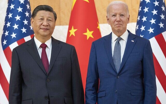 US President Joe Biden, right, stands with Chinese President Xi Jinping before a meeting on the sidelines of the G20 summit meeting, Monday, Nov. 14, 2022, in Bali, Indonesia. (AP Photo/Alex Brandon)
