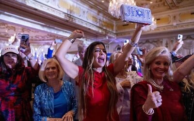 Supporters wait for former President Donald Trump to arrive to announce he is running for president for the third time at Mar-a-Lago in Palm Beach, Florida, Nov. 15, 2022. (AP Photo/Andrew Harnik)