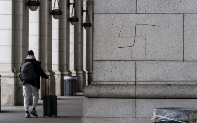 A hand-drawn swastika is seen on the front of Union Station near the Capitol in Washington, January 28, 2022. (J. Scott Applewhite/AP)