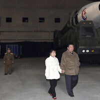This photo provided on Nov. 19, 2022, by the North Korean government shows North Korean leader Kim Jong Un, right, and his daughter inspecting a missile at Pyongyang International Airport in Pyongyang, North Korea, Friday, Nov. 18, 2022.(Korean Central News Agency/Korea News Service via AP)