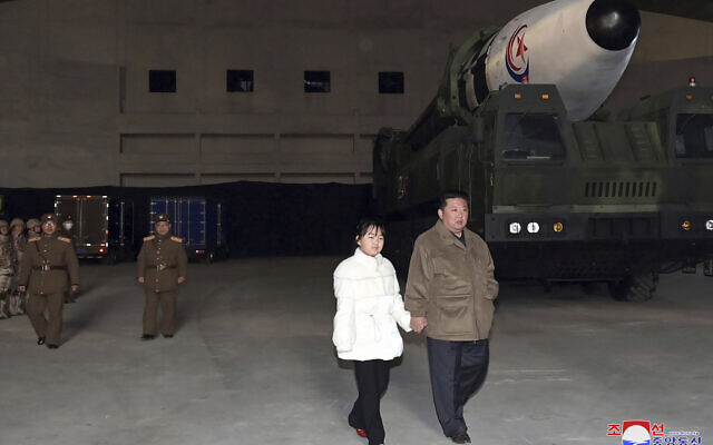 This photo provided on Nov. 19, 2022, by the North Korean government shows North Korean leader Kim Jong Un, right, and his daughter inspects a missile at Pyongyang International Airport in Pyongyang, North Korea, Friday, Nov. 18, 2022.(Korean Central News Agency/Korea News Service via AP)