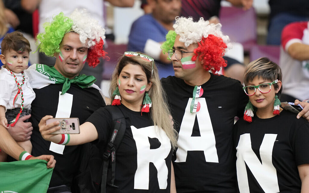 Illustrative: Iranian soccer fans pose for a selfie prior to the World Cup group B soccer match between England and Iran at the Khalifa International Stadium in Doha, Qatar, Monday, Nov. 21, 2022. (AP Photo/Frank Augstein)