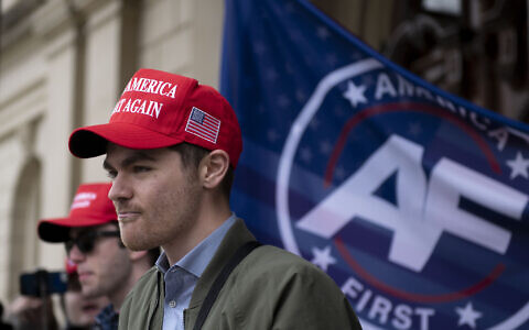 Nick Fuentes, far-right activist, holds a rally at the Lansing Capitol, in Lansing, Mich., Nov. 11, 2020. (Nicole Hester/Ann Arbor News via AP, File)