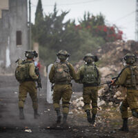 Illustrative -- Israeli security forces in Kfar Qaddum, near the West Bank city of Nablus, October 7, 2022 (Nasser Ishtayeh/Flash90)