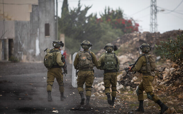 Illustrative -- Israeli security forces in Kfar Qaddum, near the West Bank city of Nablus, October 7, 2022 (Nasser Ishtayeh/Flash90)
