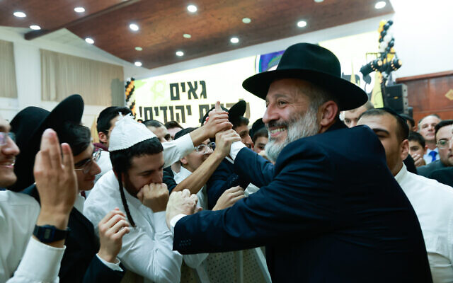 Shas party head Aryeh Deri with supporters as the results of the Israeli elections are announced, in Jerusalem. November 1, 2022 (Yossi Zamir/Flash90 )