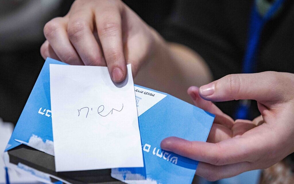 A voting slip on which someone has cast their ballot for the Messiah, as Central Election Committee workers count the final ballots at Knesset on November 3, 2022 (Olivier Fitoussi/Flash90)
