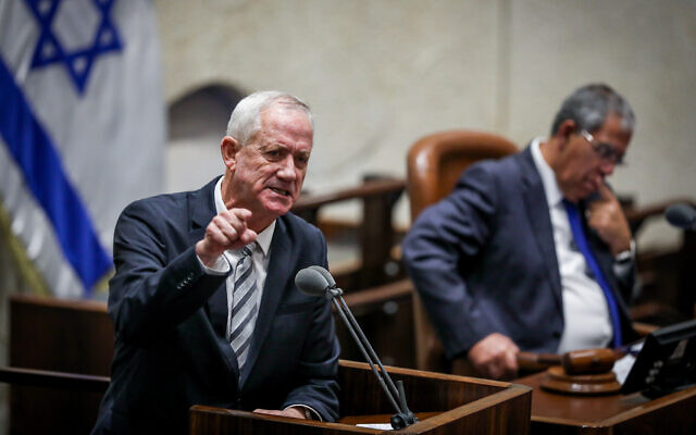 Defense Minister Benny Gantz speaks during a special plenum session to mark 27 years since the assassination of prime minister Yitzhak Rabin, at the Knesset, November 6, 2022. (Noam Revkin Fenton/Flash90)