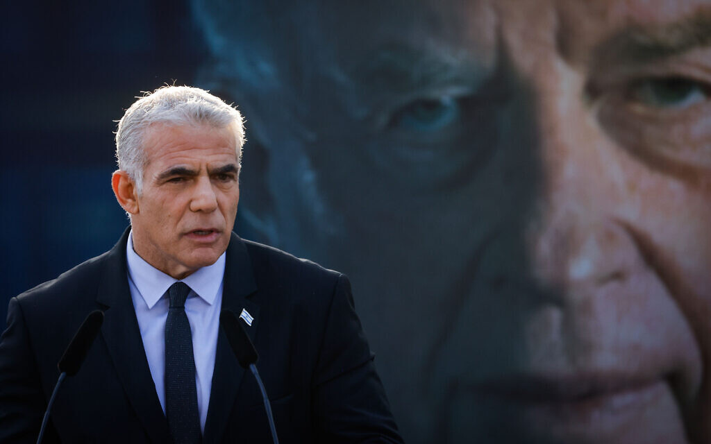 Prime Minister Yair Lapid speaks during the official memorial service for assassinated prime minister Yitzhak Rabin, held at Mount Herzl cemetery in Jerusalem, November 6, 2022. (Olivier Fitoussi/Flash90)