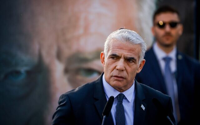 Prime Minister Yair Lapid at a memorial service marking 27 years since the assassination of late prime minister Yitzhak Rabin, held at Mount Herzl cemetery in Jerusalem, November 6, 2022. (Olivier Fitoussi/Flash90)