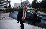 Shas chairman Aryeh Deri arrives for coalition talks at a hotel in Jerusalem on November 9, 2022. (Olivier Fitoussi/ Flash90)