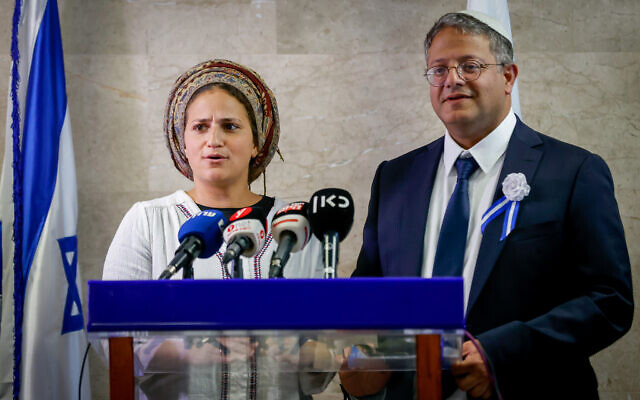Otzma Yehudit leader Itamar Ben Gvir and his wife Ayala speak during a faction meeting of the extremist party, at the Knesset in Jerusalem, on November 15, 2022. (Olivier Fitoussi/Flash90)