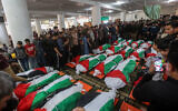The funeral of Palestinians who were killed in a fire that broke out in a building in the Jabalia refugee camp, in the northern Gaza Strip, November 18, 2022. (Attia Muhammed/Flash90)