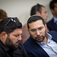 Otzma Yehudit's Almog Cohen (L) and Yitzhak Wasserlauf at the Knesset, November 21, 2022. (Yonatan Sindel/Flash90)