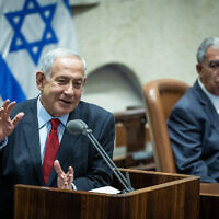 Prime Minister-designate Benjamin Netanyahu speaks in the Knesset on November 21, 2022. (Yonatan Sindel/Flash90)