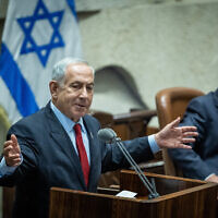 Likud party head Benjamin Netanyahu speaks in the plenary hall of the Knesset  on November 21, 2022. (Yonatan Sindel/Flash90)