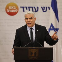 Israeli Prime Minister Yair Lapid speaks during a faction meeting at the Knesset, the Israeli parliament in Jerusalem, on November 21, 2022. (Yonatan Sindel/Flash90)