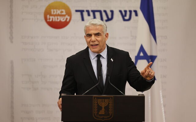 Prime Minister Yair Lapid speaks during a faction meeting at the Knesset, the Israeli parliament in Jerusalem, on November 21, 2022. (Yonatan Sindel/Flash90)