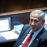 Likud party chairman Benjamin Netanyahu attends a plenum session in the Knesset on November 21, 2022. (Yonatan Sindel/Flash90)