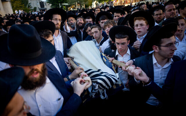 The funeral of Aryeh Schupak who was killed in a terror attack when two explosions at two bus stops one at the entrance to Jerusalem and one in Ramot left one person killed and at least another 13 injured, November 23, 2022. (Yonatan Sindel/Flash90)