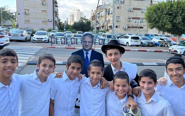 Young supporters of Otzma Yehudit's Itamar Ben Gvir in Kiryat Malachi on November 1, 2022 (Jacob Magid/Times of Israel)