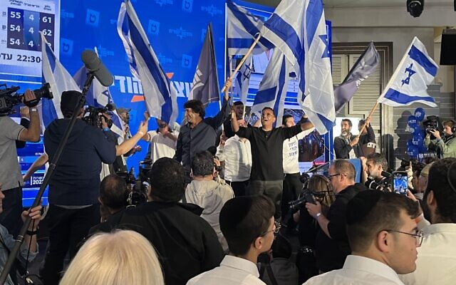 The Otzma Yehudit party's campaign headquarters after the results of exit polls are announced, November 1, 2022. (Jacob Magid/Times of Israel)