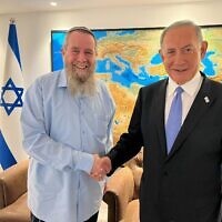 MK Avi Maoz, left, and Likud head Benjamin Netanyahu after agreeing to form a governing coalition on November 27, 2022. (Courtesy Likud)