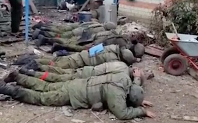 Russian troops surrendering in Ukraine in a clip widely shared on social media in November 2022. (Screen capture/Twitter)