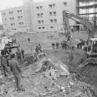 Rescue workers search for survivors after an explosion at Israeli military headquarters in the Lebanese city of Tyre in 1982. (Wikimedia Commons/IDF Archive)