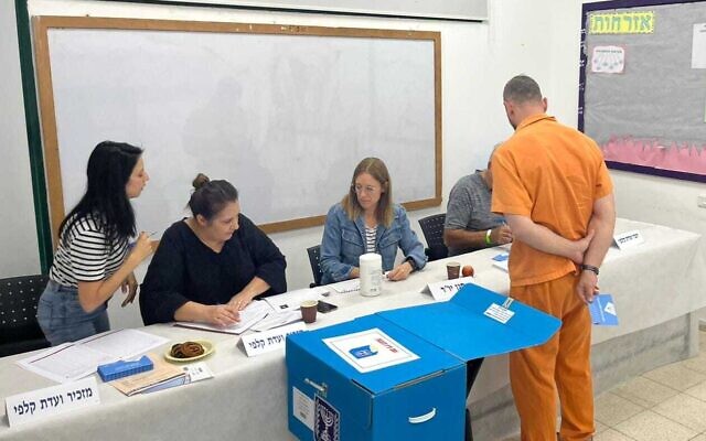An incarcerated man votes Israel's general elections at a prison, on November 1, 2022. (Israel Prison Service)