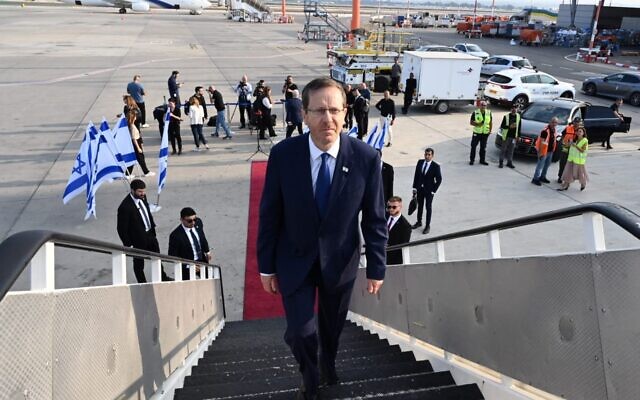 President Isaac Herzog departs Israel for the COP27 UN Climate Change Conference in Sharm el-Sheikh, Egypt, November 7, 2022. (Haim Zach/GPO)