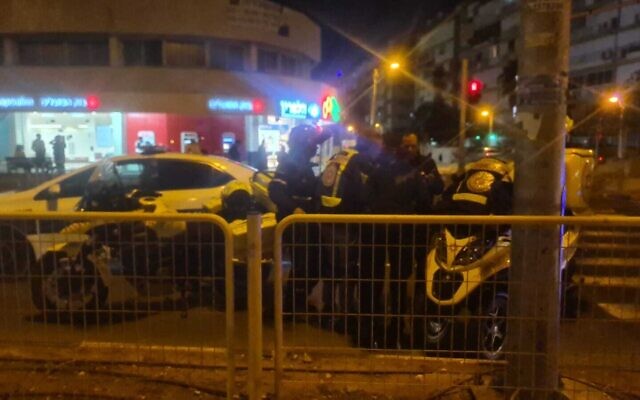 First responders at the scene of a stabbing incident in Holon on November 23, 2022. (Magen David Adom)
