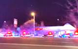 Police cars seen outside a gay club where an assailant opened fire and killed five people, in Colorado, US, November 20, 2022. (Twitter/Screenshot; used in accordance with Clause 27a of the Copyright Law)