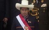 File: Peruvian President Pedro Castillo wears the presidential sash as he exits Congress after his inauguration ceremony in Lima, July 28, 2021. (Photo by Janine Costa / AFP)