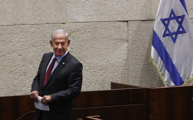 Incoming prime minister Benjamin Netanyahu looks on, after delivering a speech at the Knesset, December 12, 2022. (Gil Cohen-Magen / AFP)