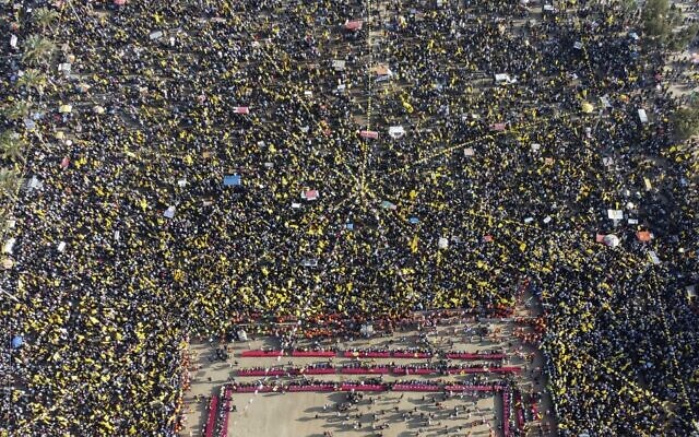 An aerial picture shows Palestinians attending a rally marking the 58th anniversary of the Fatah movement foundation, in Gaza City, on December 31, 2022. (Mahmud Hams/AFP)
